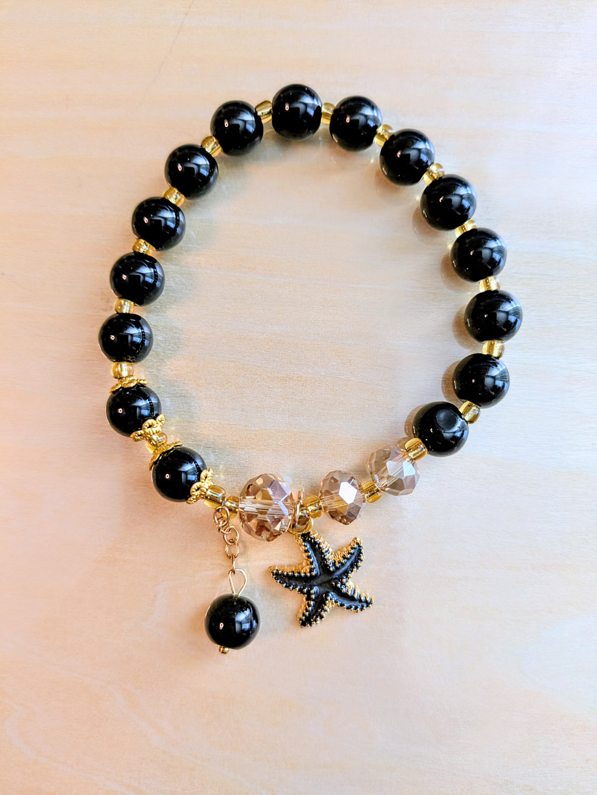 Black and Crystal Glass Charmed Bracelet