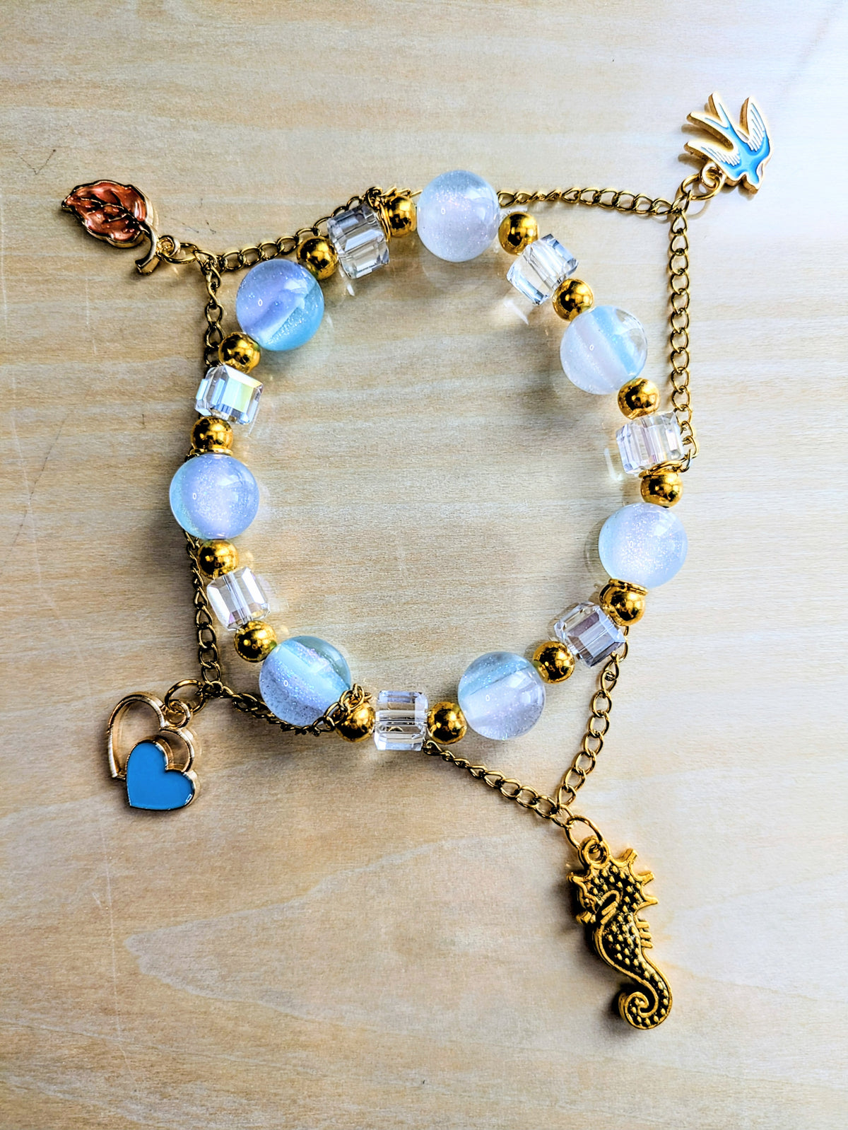 Ocean Blue Cat's Eye Clear Square Charmed Beaded Bracelet