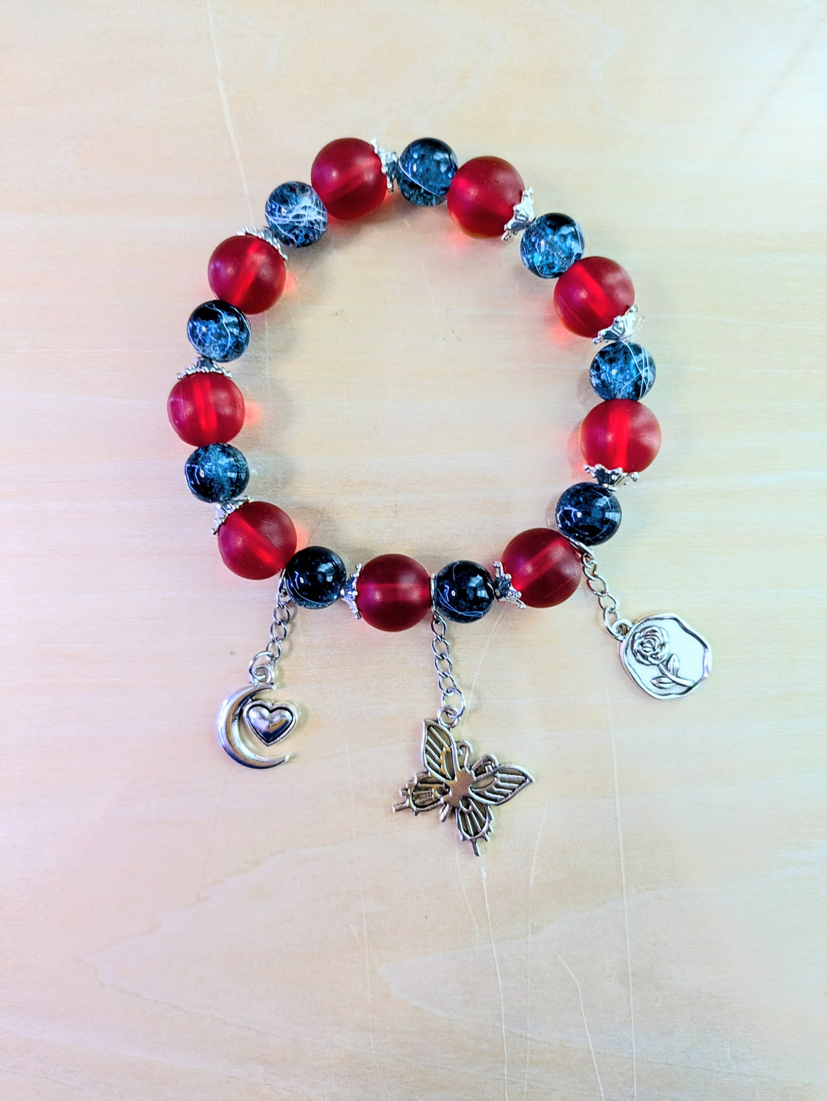 Blue/Red Glass Beaded Charmed Bracelet