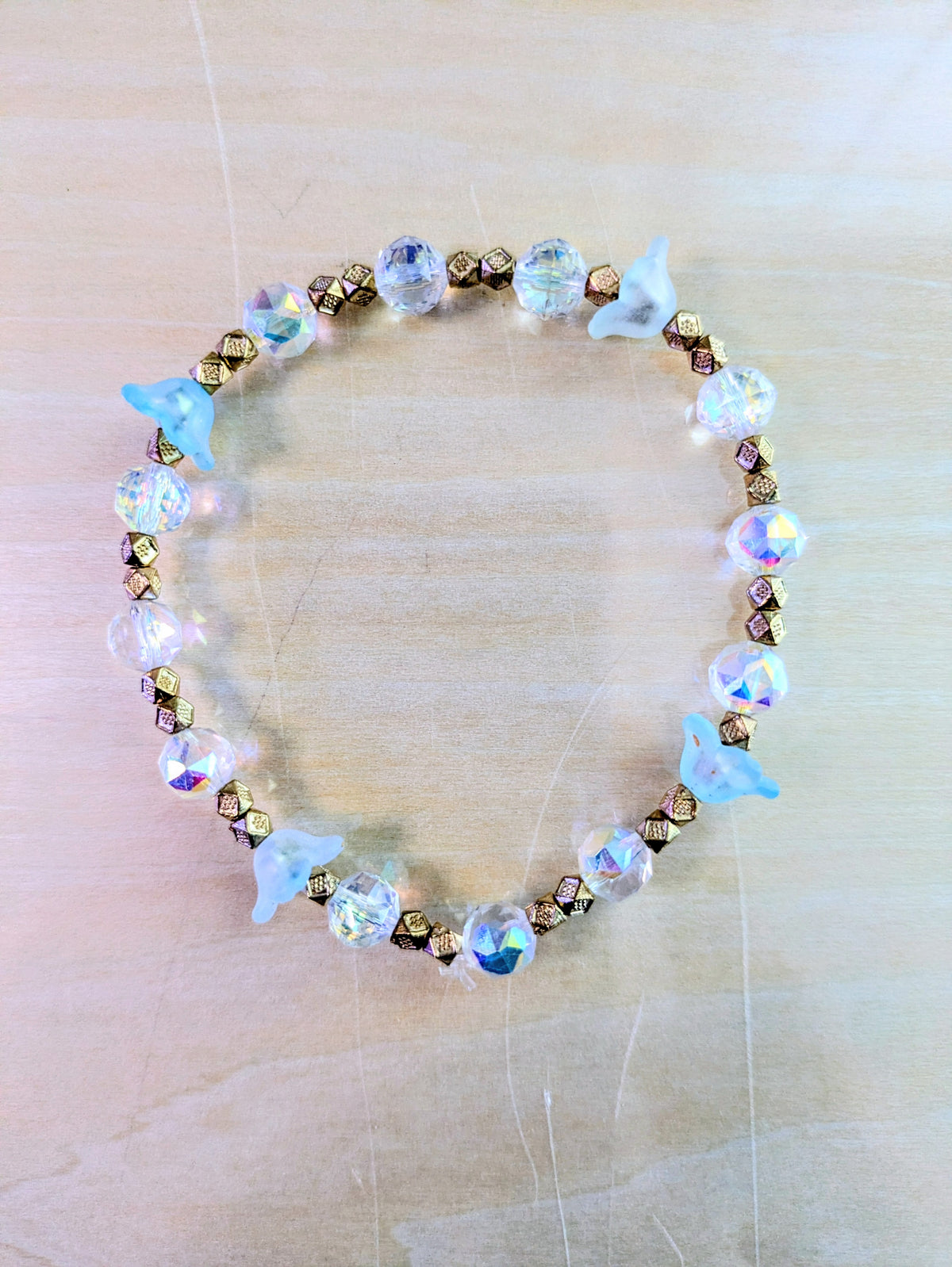 Clear Beads with Blue Flower Petals Beaded Bracelet